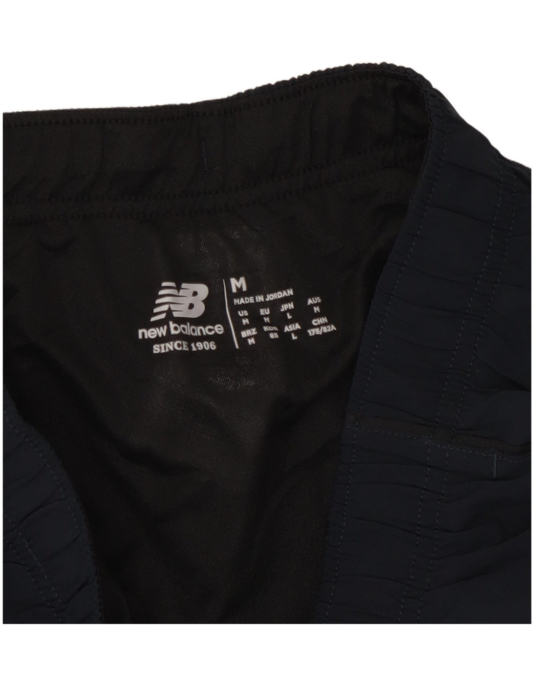 New Balance Short de Sport Homme Bleu Marine Moyen