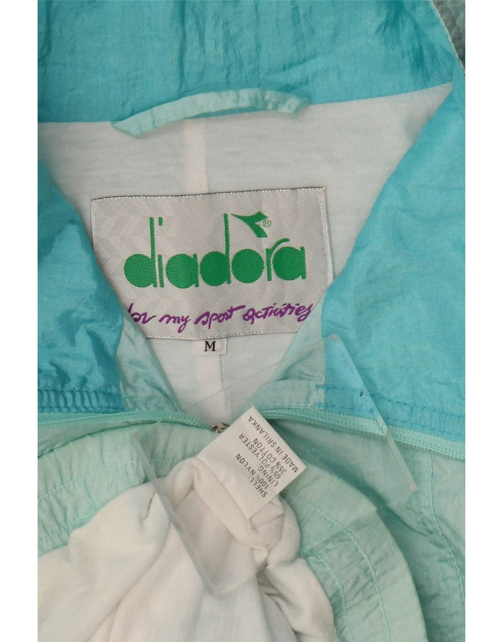 Diadora Veste de survêtement surdimensionnée pour femme UK 14 Bleu moyen floral