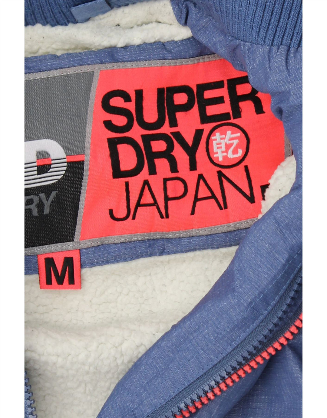 SUPERDRY Veste coupe-vent à capuche graphique pour femme UK 14 Bleu moyen
