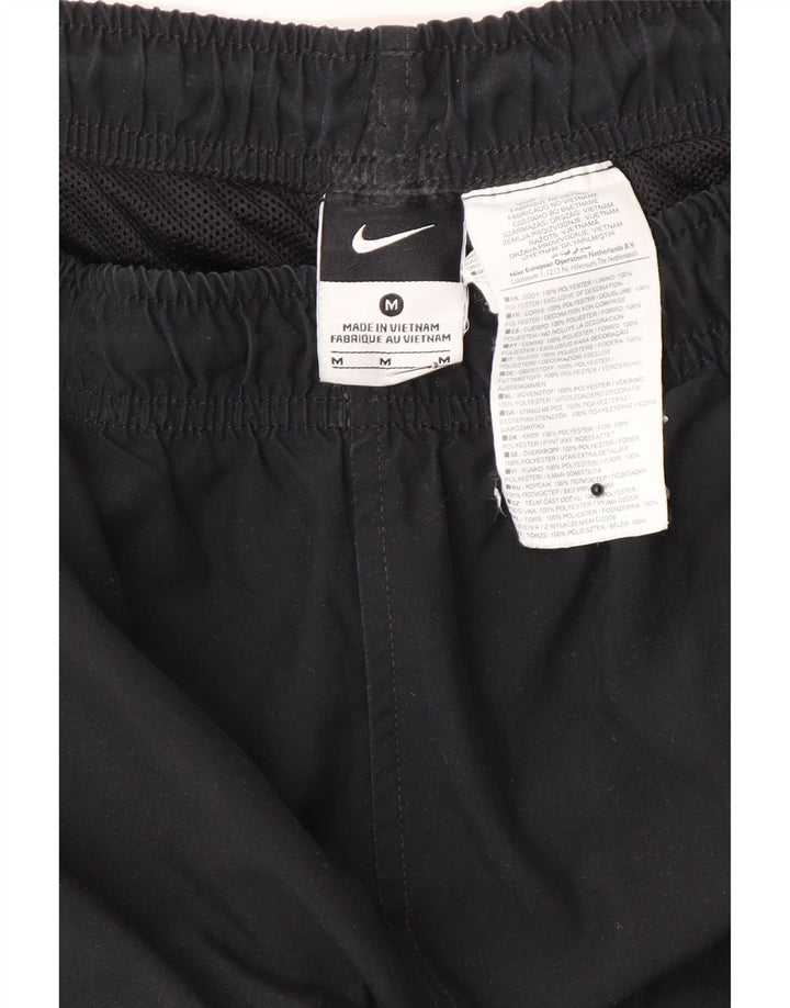 Pantalon de survêtement Nike pour homme en polyester color block noir moyen