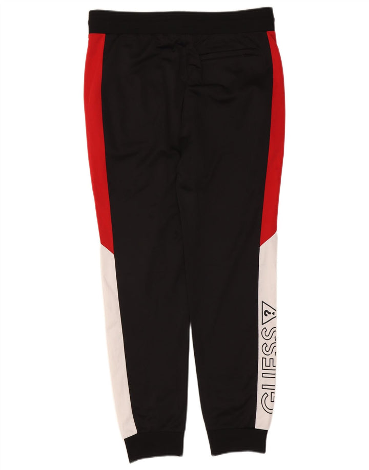 Guess Pantalon de Survêtement Graphique Joggers Homme Noir Moyen Colourblock