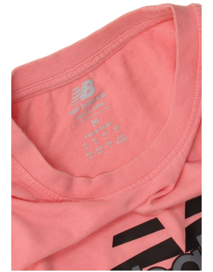 New Balance T-Shirt Graphique Homme Rose Moyen