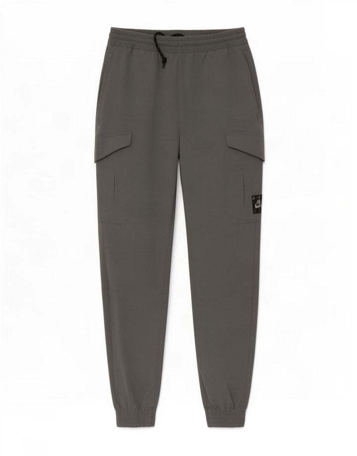 Pantalon de survêtement cargo Nike Homme Pantalon de jogging en nylon gris moyen