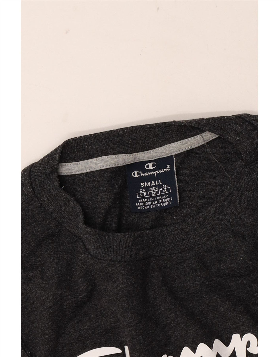 CHAMPION T-Shirt Graphique Coupe Ample Homme Petit Gris