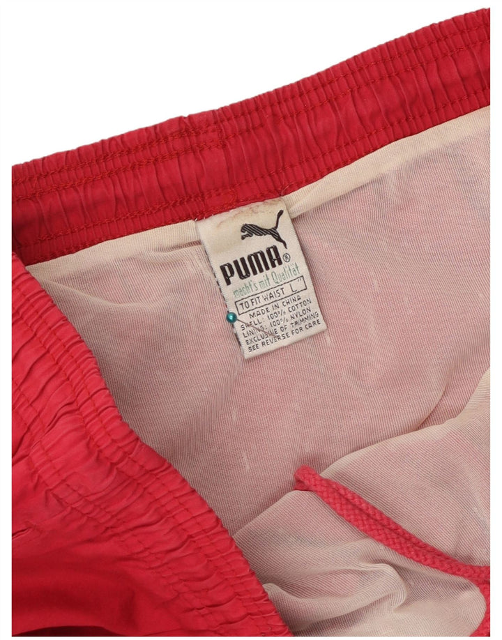 Puma Short de Sport Homme Rouge Large Coton Géométrique