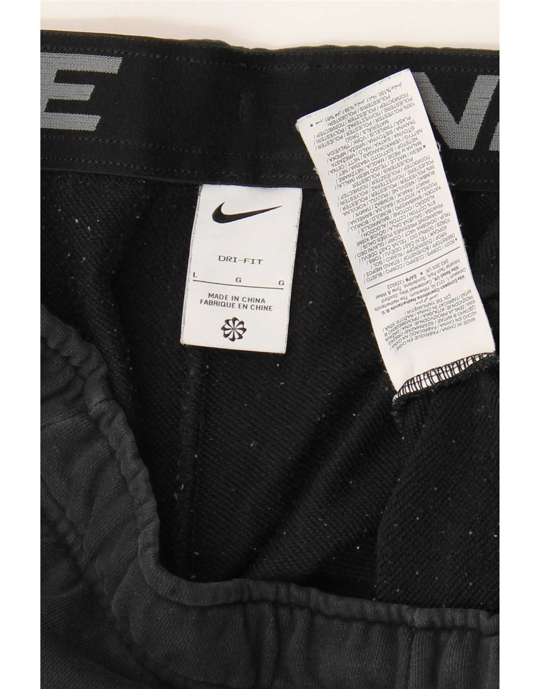 Nike Short de sport Dri Fit pour homme en coton noir Taille L