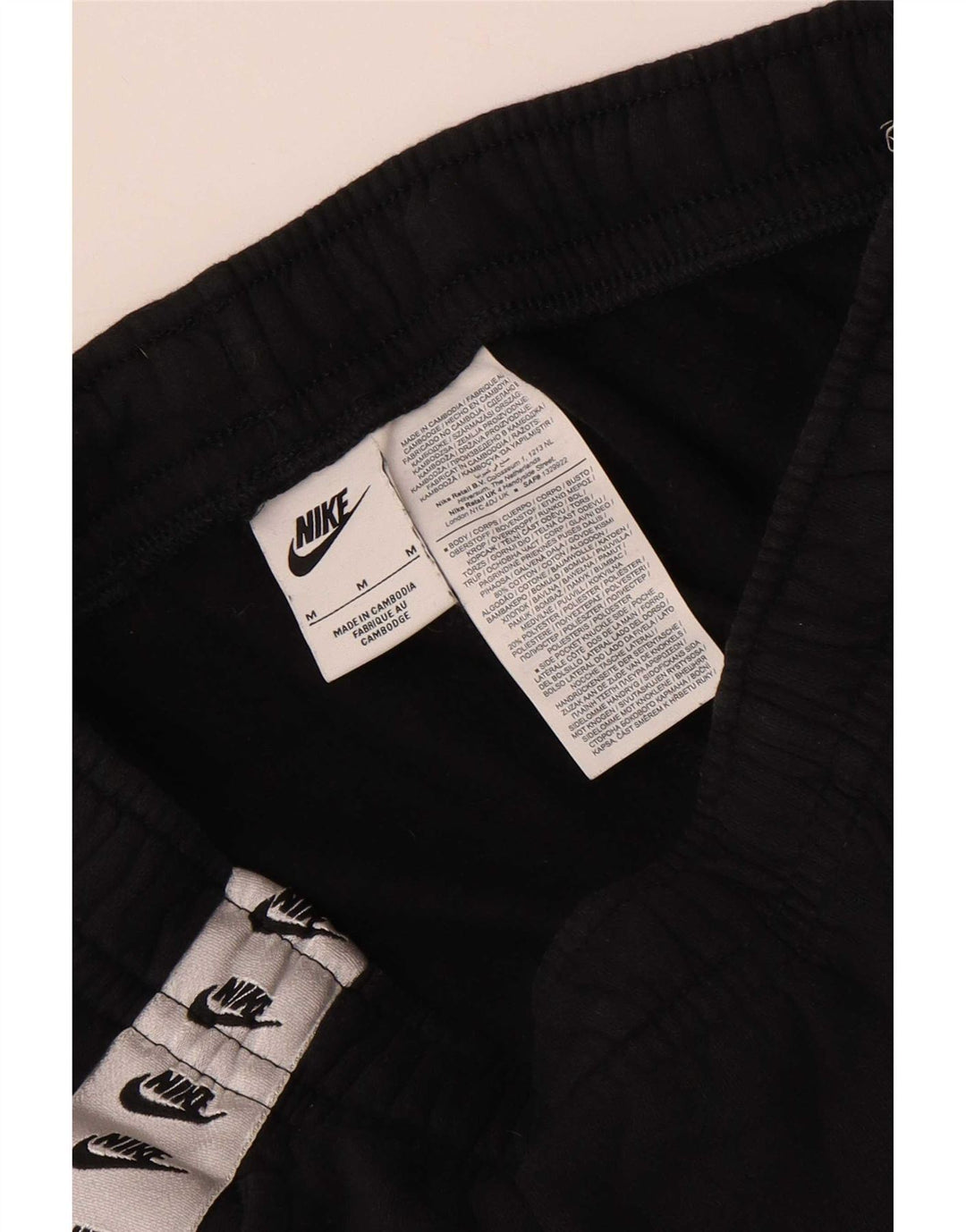 Nike Pantalon de survêtement graphique pour homme Noir moyen Colourblock