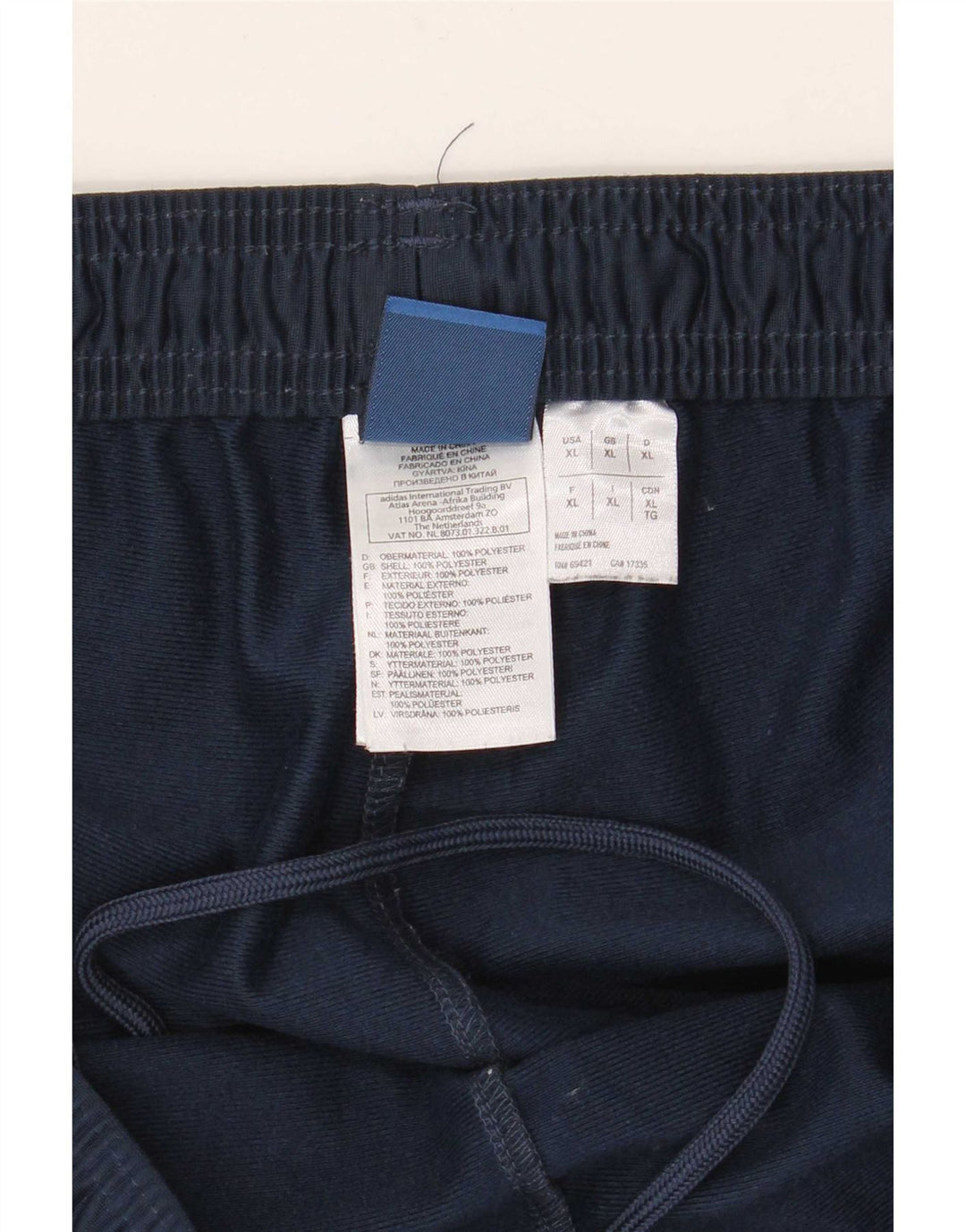 Reebok Pantalon de Survêtement Graphic Homme XL Bleu Marine Colorblock Polyester