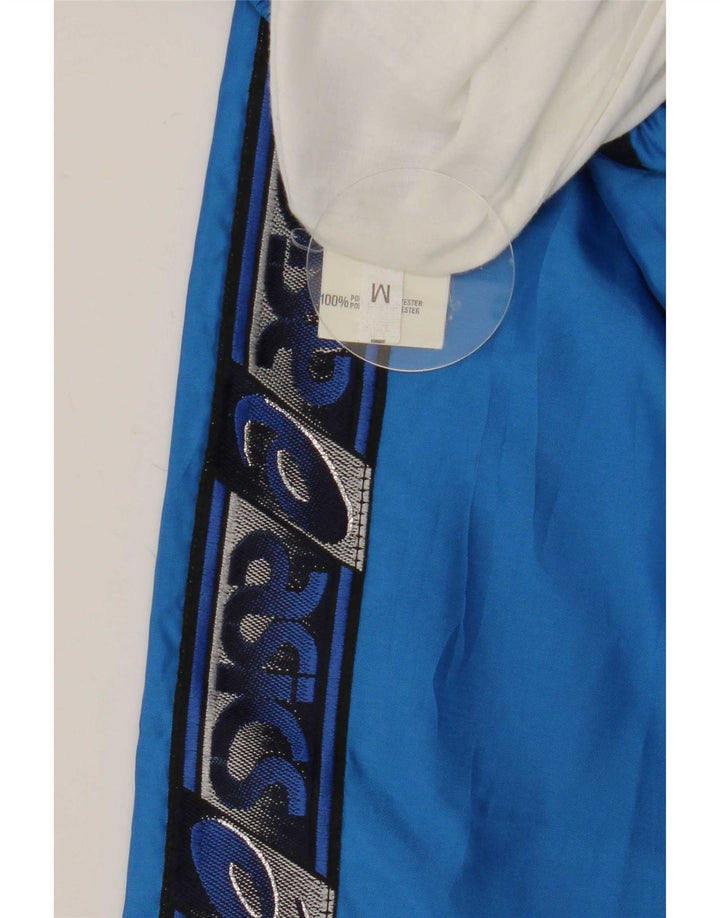 Asics Pantalon de Survêtement Graphique Homme Bleu Moyen Polyester Colorblock