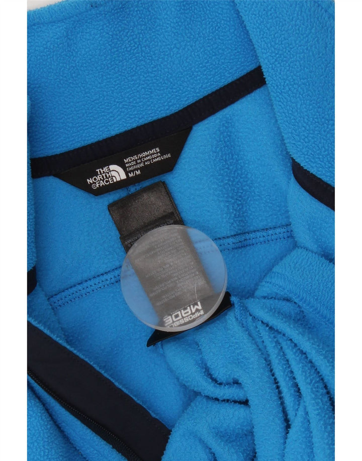 THE NORTH FACE Pull Polaire à Col Zippé Homme Bleu Moyen Colourblock