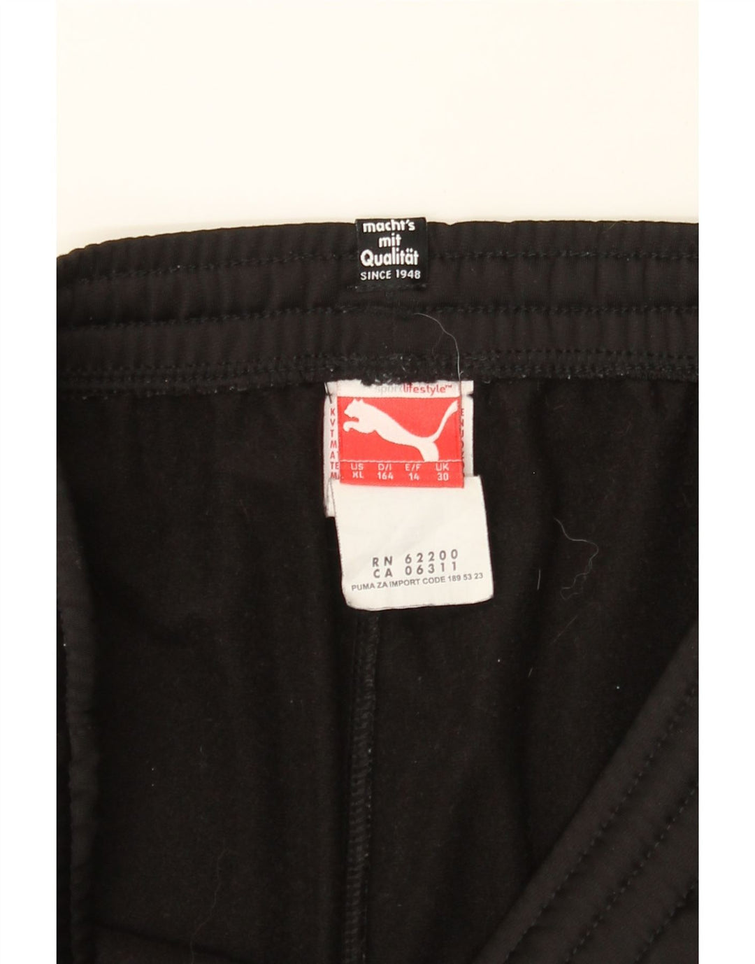PUMA Boys Graphic Tracksuit Trousers Joggers 13-14 Years Black Polyester Vintage Puma and Second-Hand Puma from Messina Hembry 