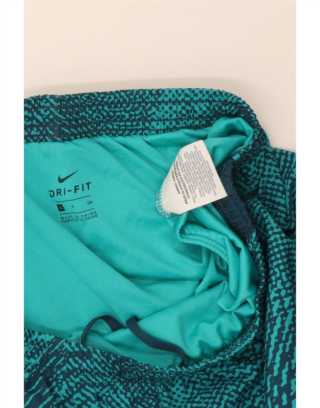 NIKE Short de sport Dri Fit pour femme UK 10 Petit bleu géométrique en polyester