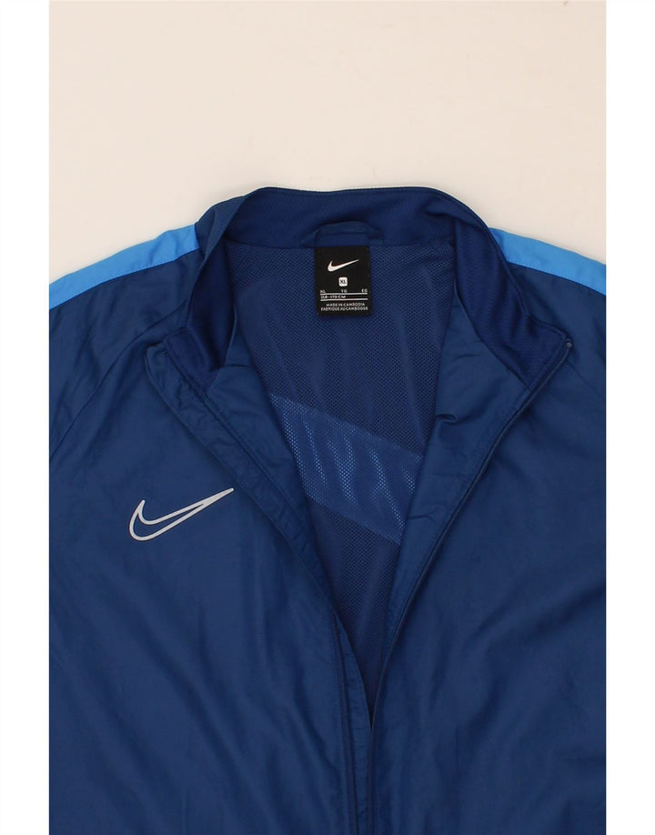 NIKE Boys Graphic Tracksuit Top Jacket 13-14 Years XL Navy Blue Vintage Nike and Second-Hand Nike from Messina Hembry 