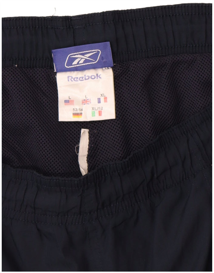 Reebok Short de Sport Homme Large Bleu Marine