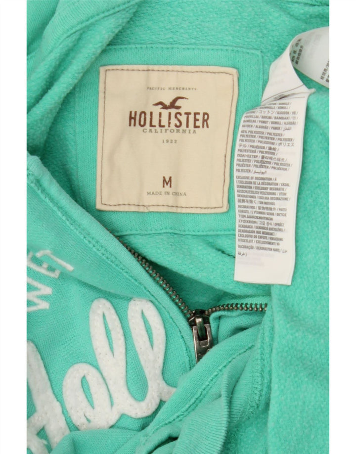 HOLLISTER Pull à capuche zippé graphique pour femme UK 14 Coton turquoise moyen