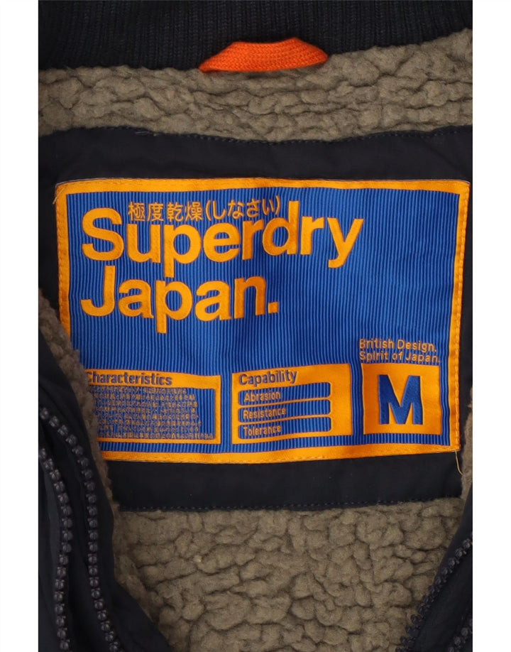 SUPERDRY Veste coupe-vent à capuche pour femme UK 14 Bleu marine moyen Polyester