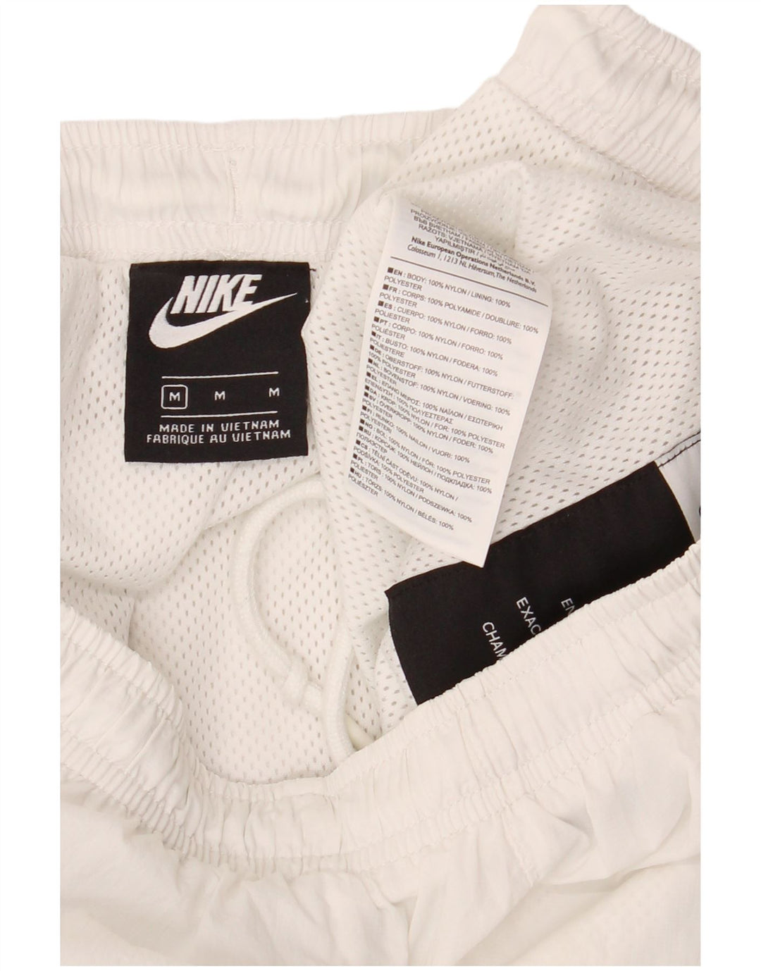 Nike Pantalon de survêtement pour homme en nylon color block blanc moyen