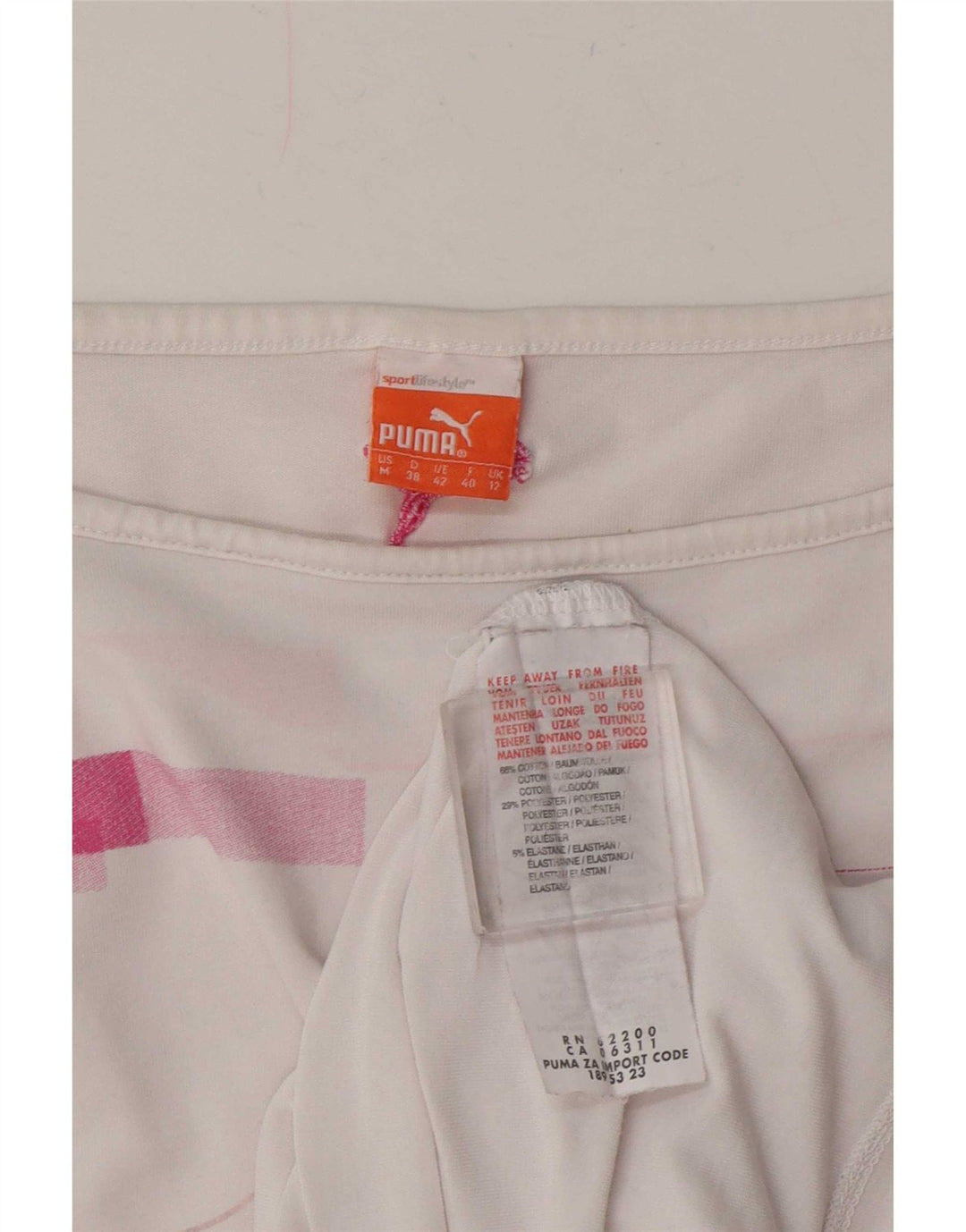 Puma T-shirt pour femme en coton géométrique blanc moyen UK 12