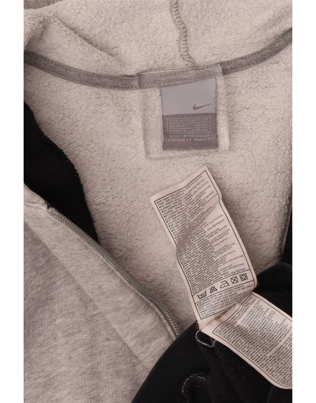 Nike Pull à capuche zippé graphique pour homme UK 39/41 Noir moyen Colourblock