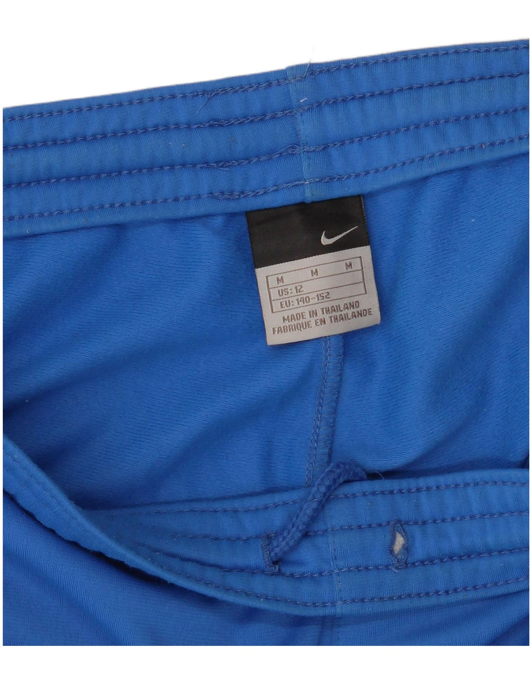 NIKE Pantalon de survêtement graphique garçon 10-11 ans Bleu moyen colour block