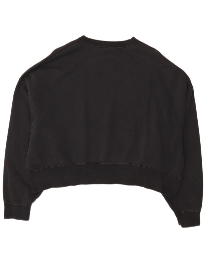 Nike Sweat-shirt court surdimensionné pour femme UK 14 en coton noir moyen
