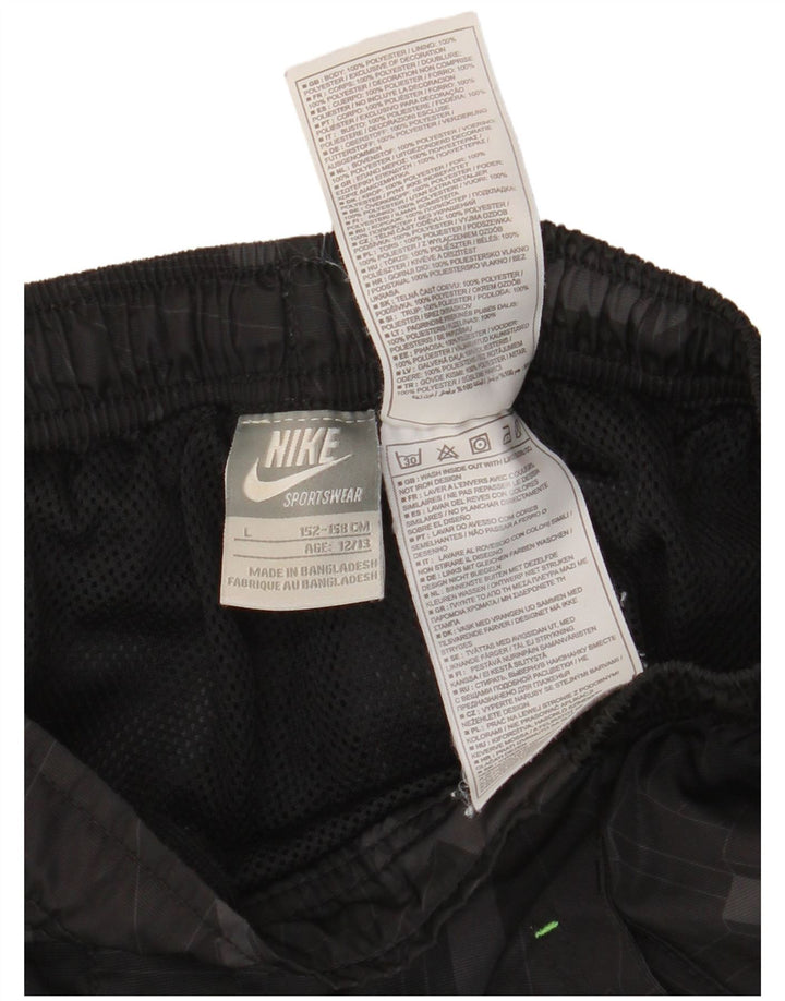 NIKE Short de sport garçon 12-13 ans Grand Noir Géométrique Polyester
