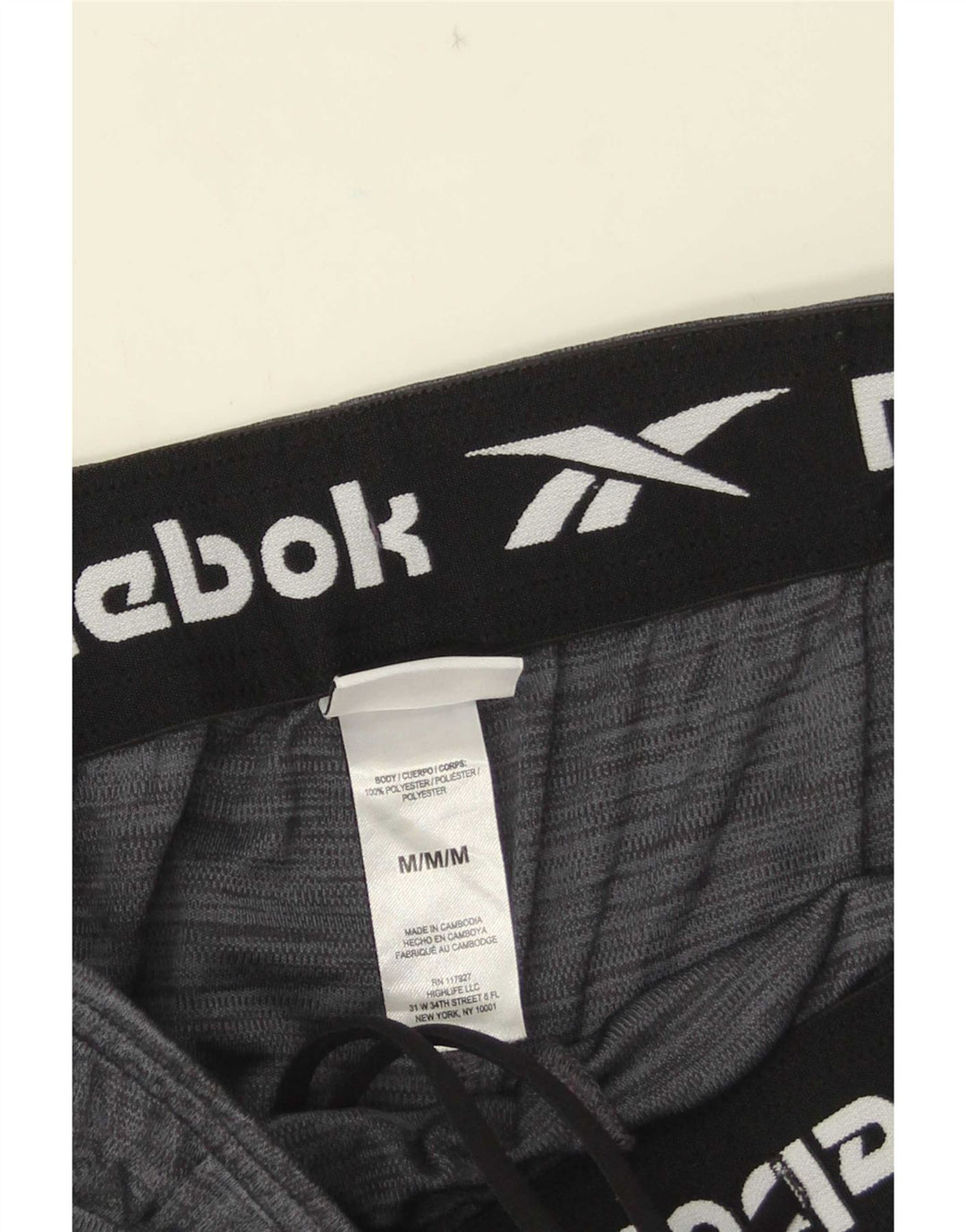 Reebok Short de Sport Homme Gris Moyen Polyester