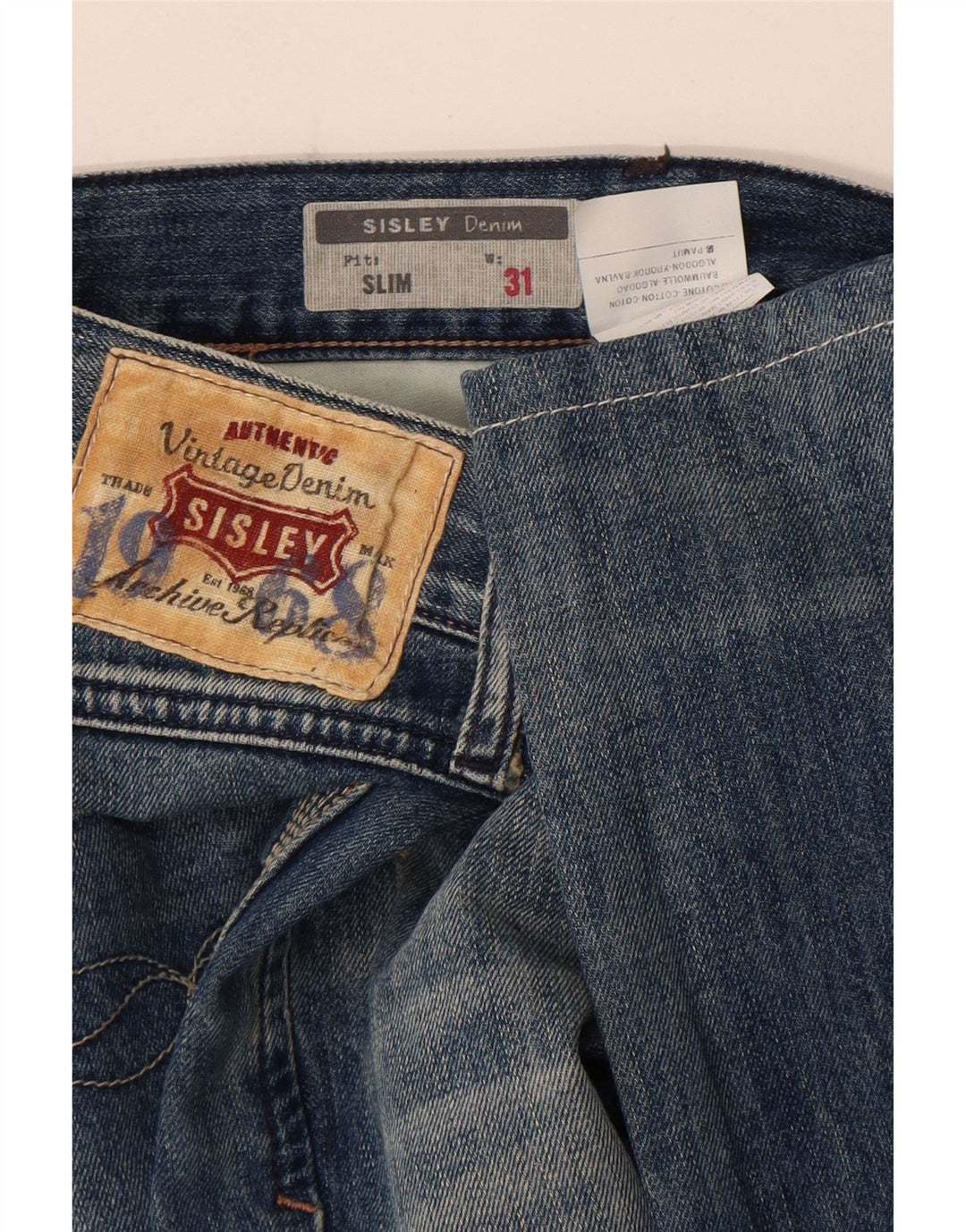 Sisley Jean Slim effet vieilli W31 L33 bleu coton