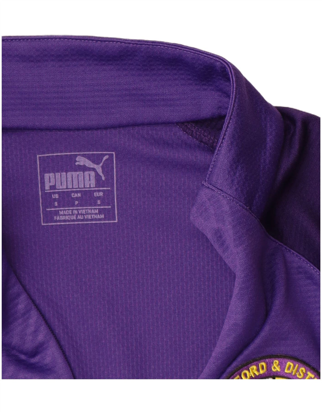 PUMA Haut de survêtement pour homme avec col zippé et motif géométrique Violet Taille S