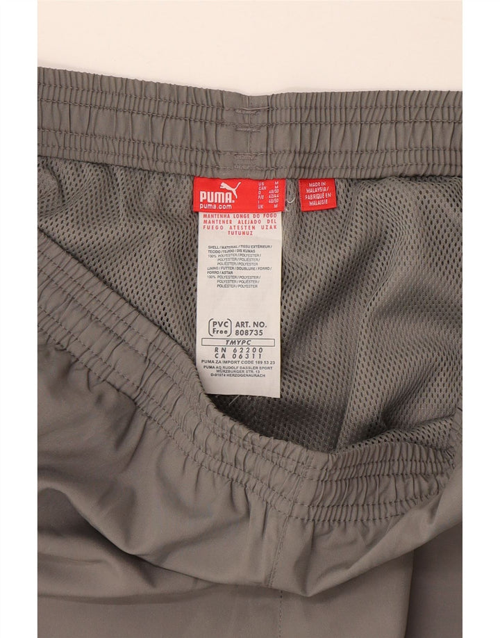 Puma Pantalon de Survêtement Graphic Capri Homme Gris Moyen Polyester