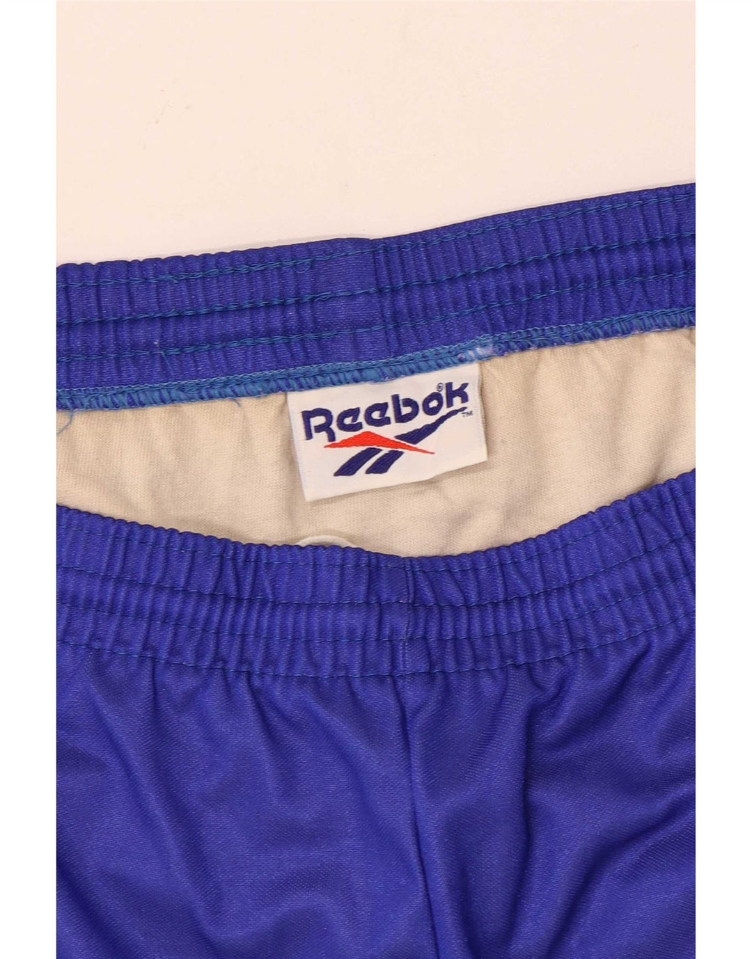 Reebok Short de Sport Homme Large Bleu Colorblock