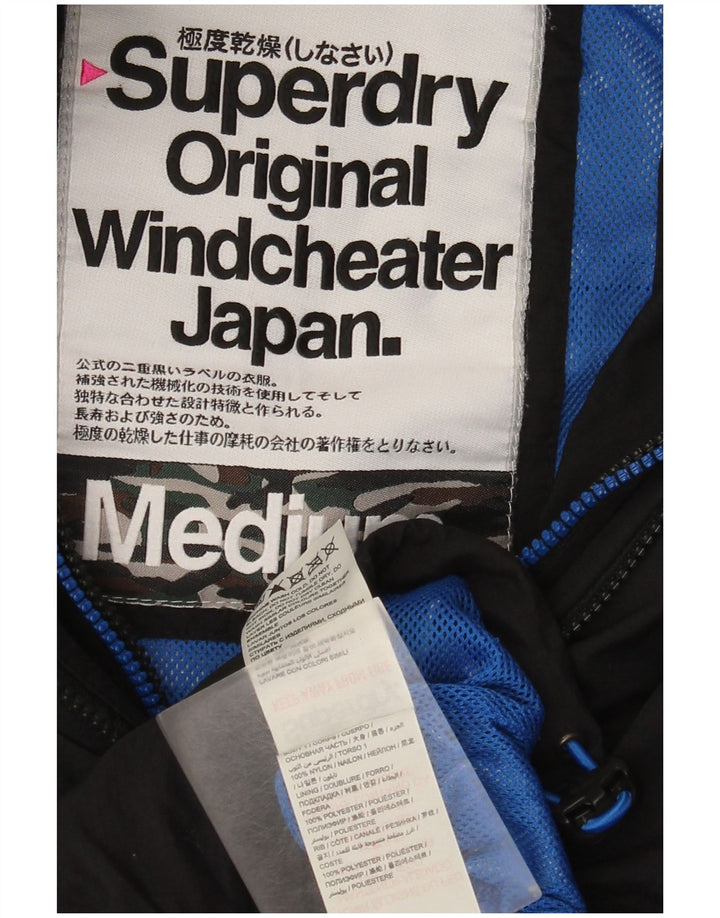 Superdry Veste de pluie à capuche Windcheater pour femme UK 14 Medium Black Nylon