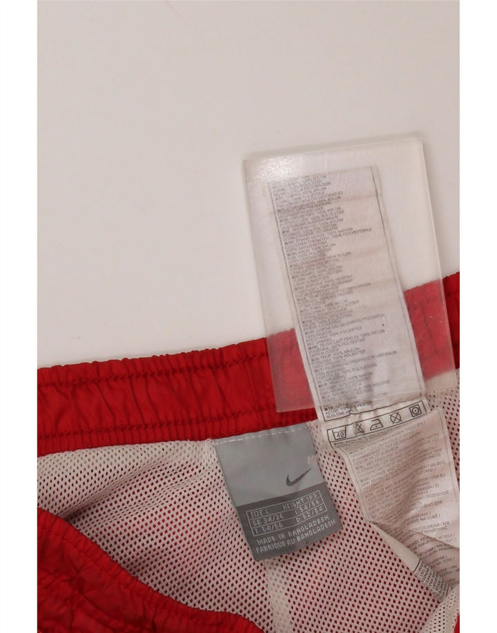 NIKE Pantalon de survêtement pour hommes Large Nylon rouge