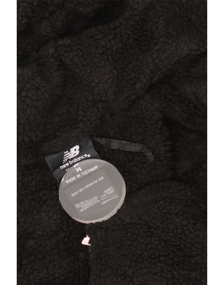 New Balance Sweat à Capuche Sherpa Zip Homme Noir Moyen Polyester