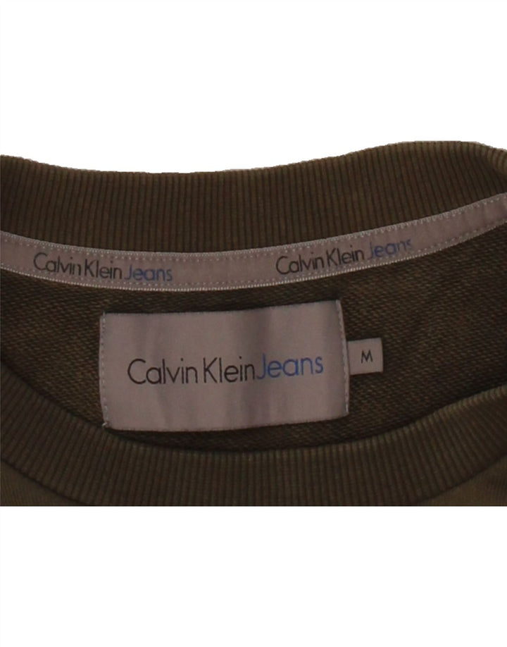 CALVIN KLEIN JEANS Mens Graphic Sweatshirt Jumper Medium Khaki Cotton Vintage Calvin Klein Jeans and Second-Hand Calvin Klein Jeans from Messina Hembry 