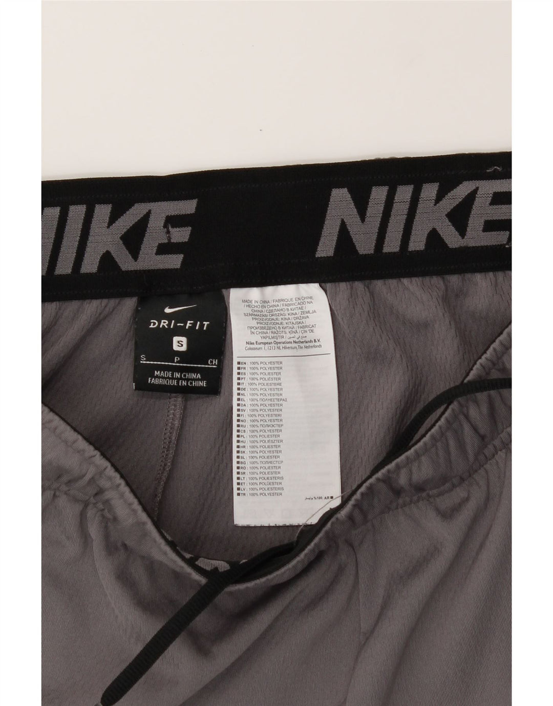 NIKE Mens Dri Fit Graphic Sport Shorts Small Grey Polyester Vintage Nike and Second-Hand Nike from Messina Hembry 