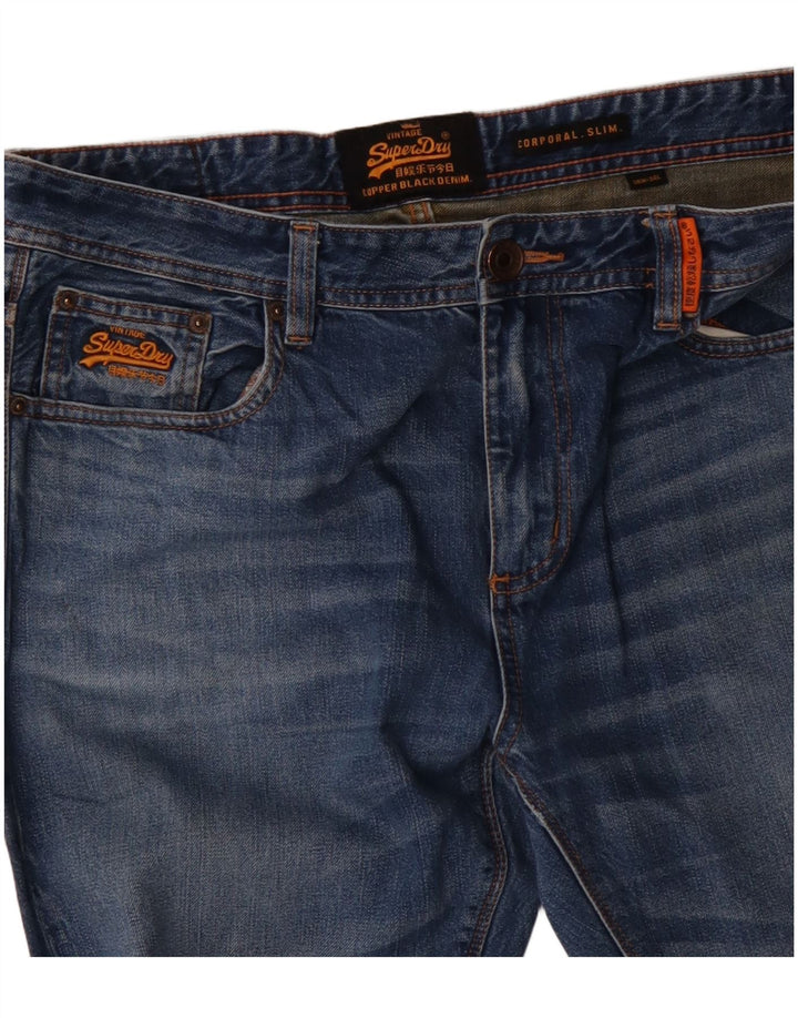 SUPERDRY Jean Corporal Slim Homme W36 L34 Bleu Coton