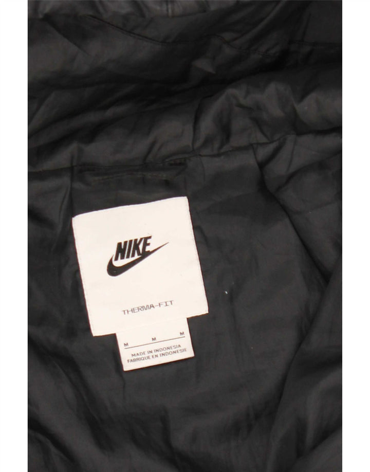 Nike Veste matelassée surdimensionnée à capuche Therma-Fit pour femme UK 14 Noir moyen