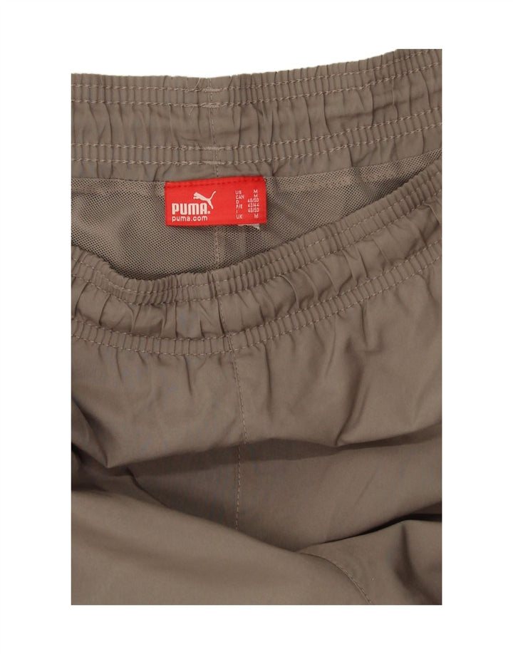 Puma Short Graphic Sport Homme Marron Moyen