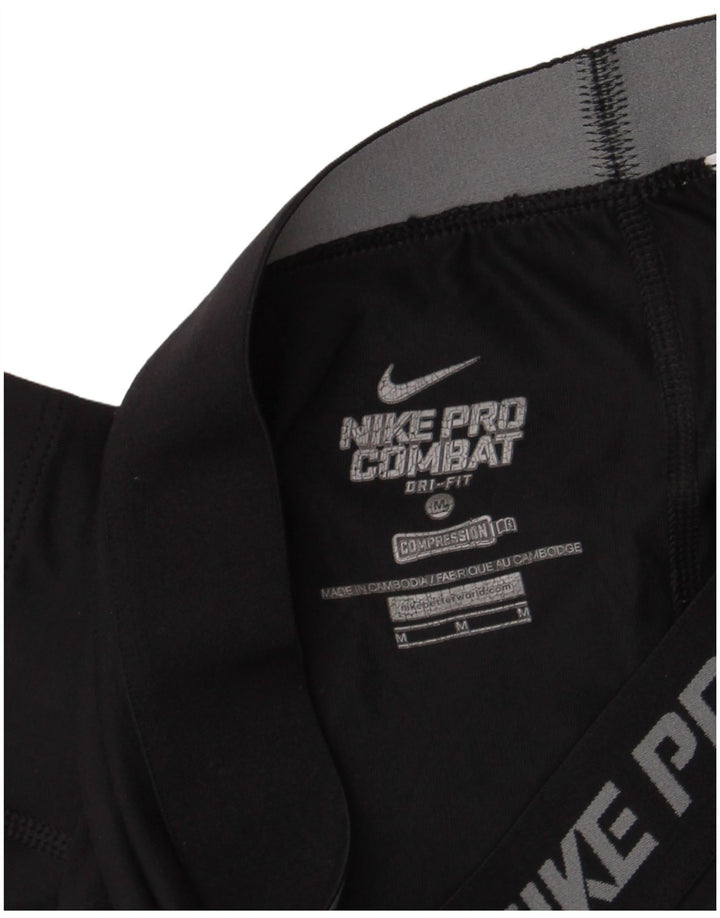 Nike Legging Capri Dri Fit Graphic pour femme UK 12 Noir moyen