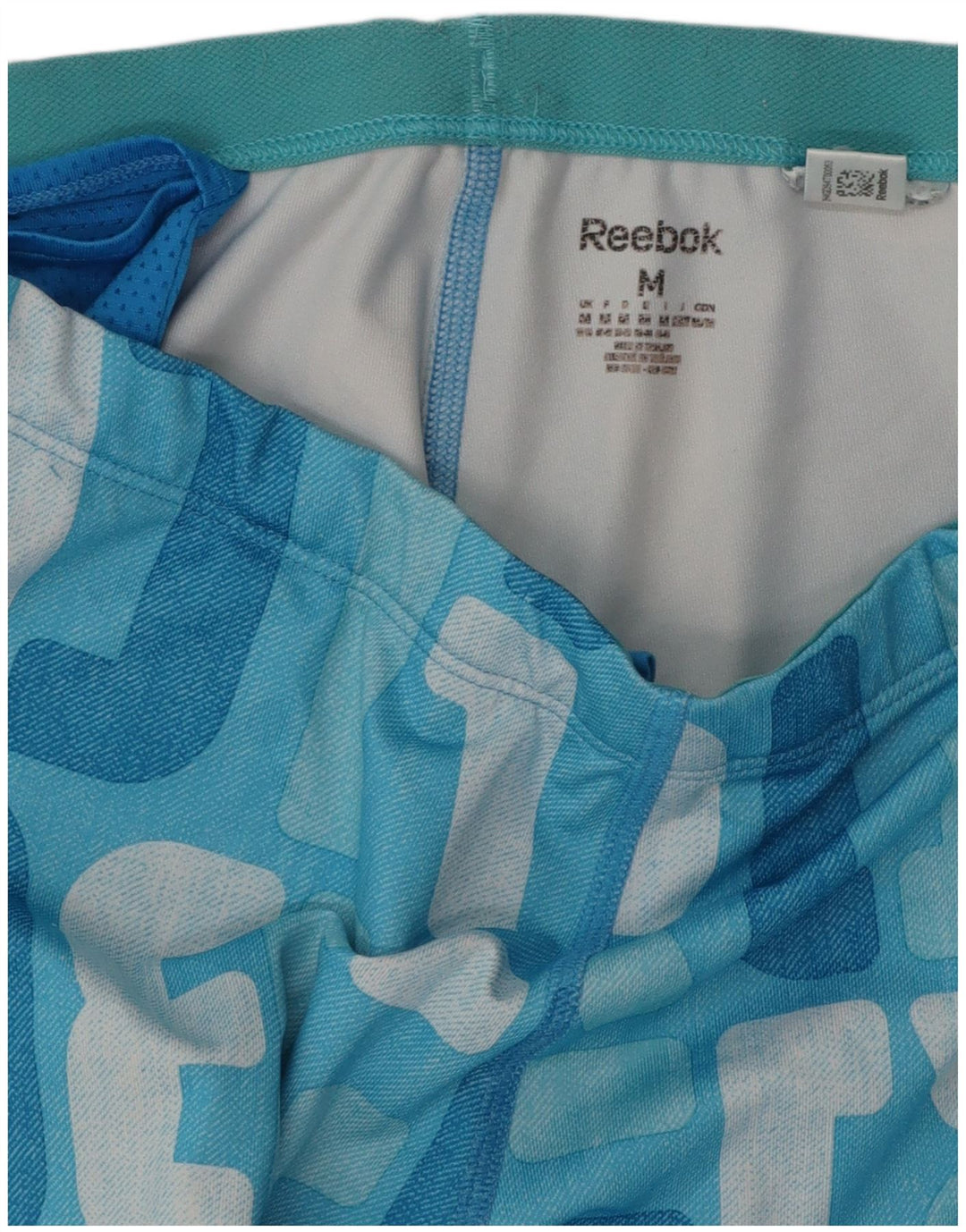 REEBOK Pantalon de survêtement graphique pour femme UK 12 Bleu moyen Colourblock