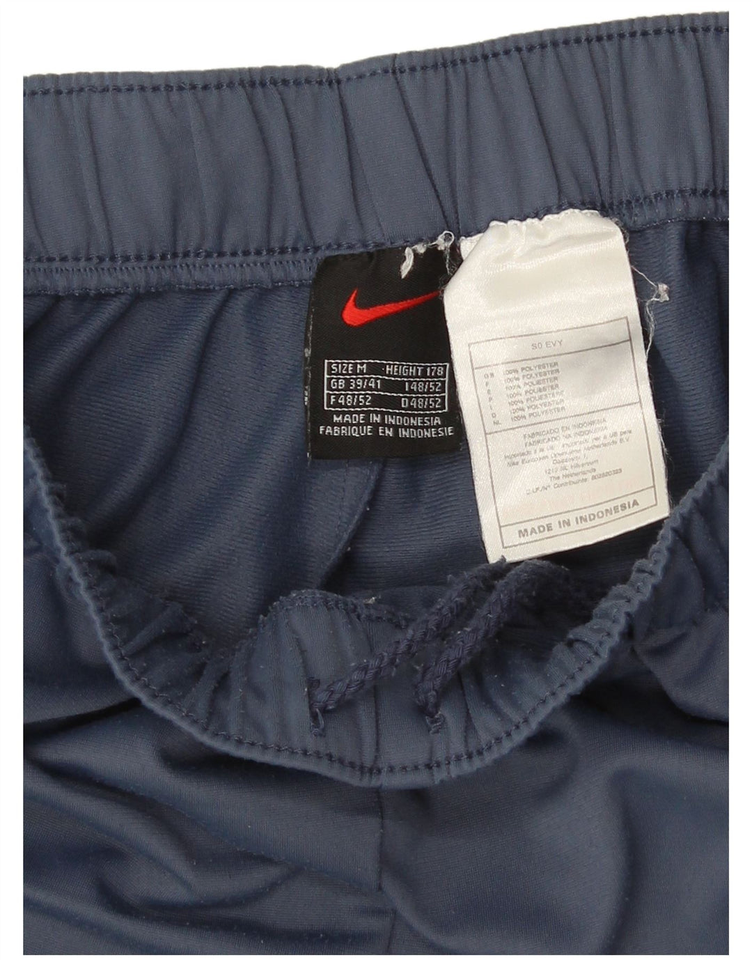 Nike Pantalon de survêtement graphique pour homme UK 39/41 Bleu moyen Polyester