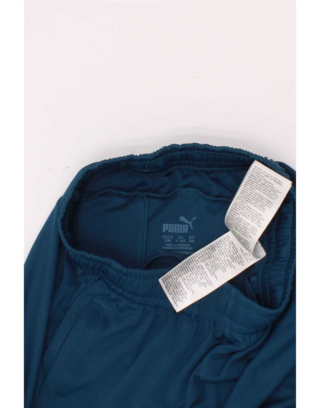 Puma Short de sport garçon 9-10 ans Bleu Géométrique Polyester