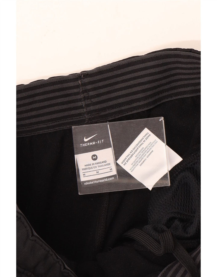 Nike Pantalon de survêtement Therma-Fit Noir Moyen Polyester