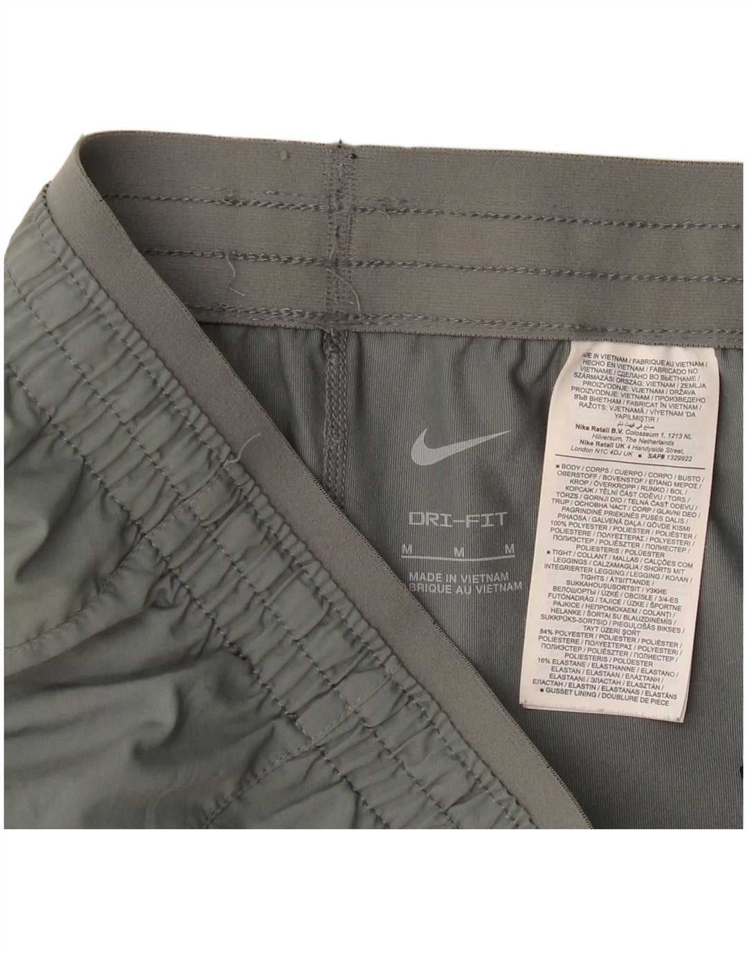 Nike Short de sport Dri Fit pour femme UK 14 Gris moyen Polyester