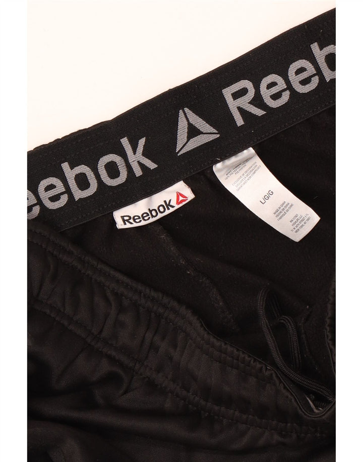 REEBOK Pantalon de Survêtement Homme Joggers Large Noir Polyester