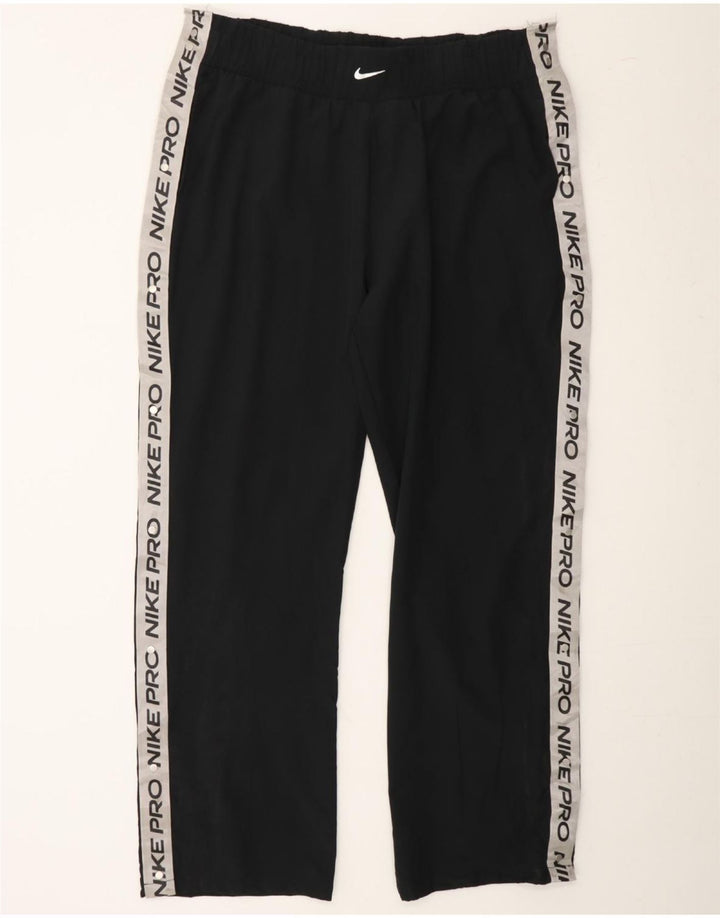 NIKE Mens Graphic Tracksuit Trousers XL Black Colourblock Polyester Vintage Nike and Second-Hand Nike from Messina Hembry 