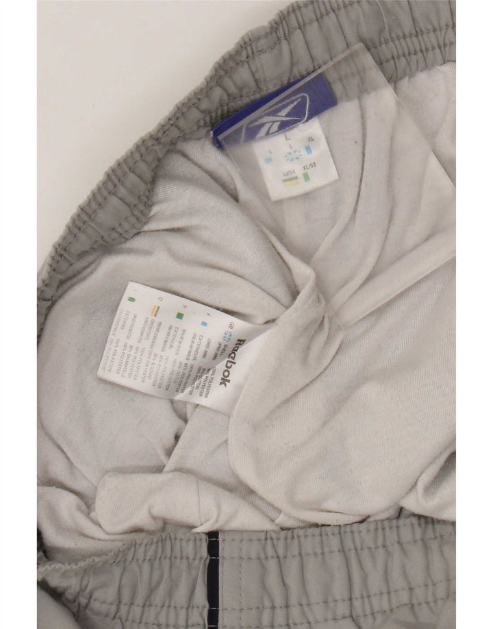 Reebok Pantalon de Survêtement Graphic Homme Joggers Large Gris Polyester