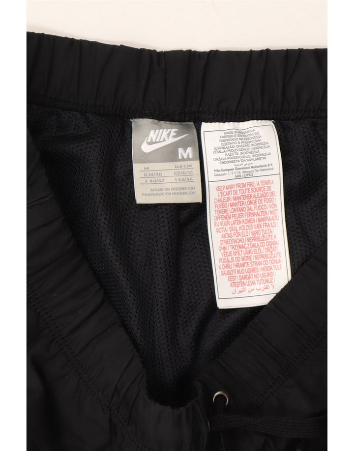NIKE Womens Capri Tracksuit Trousers UK 10/12 Medium Black Polyester Vintage Nike and Second-Hand Nike from Messina Hembry 
