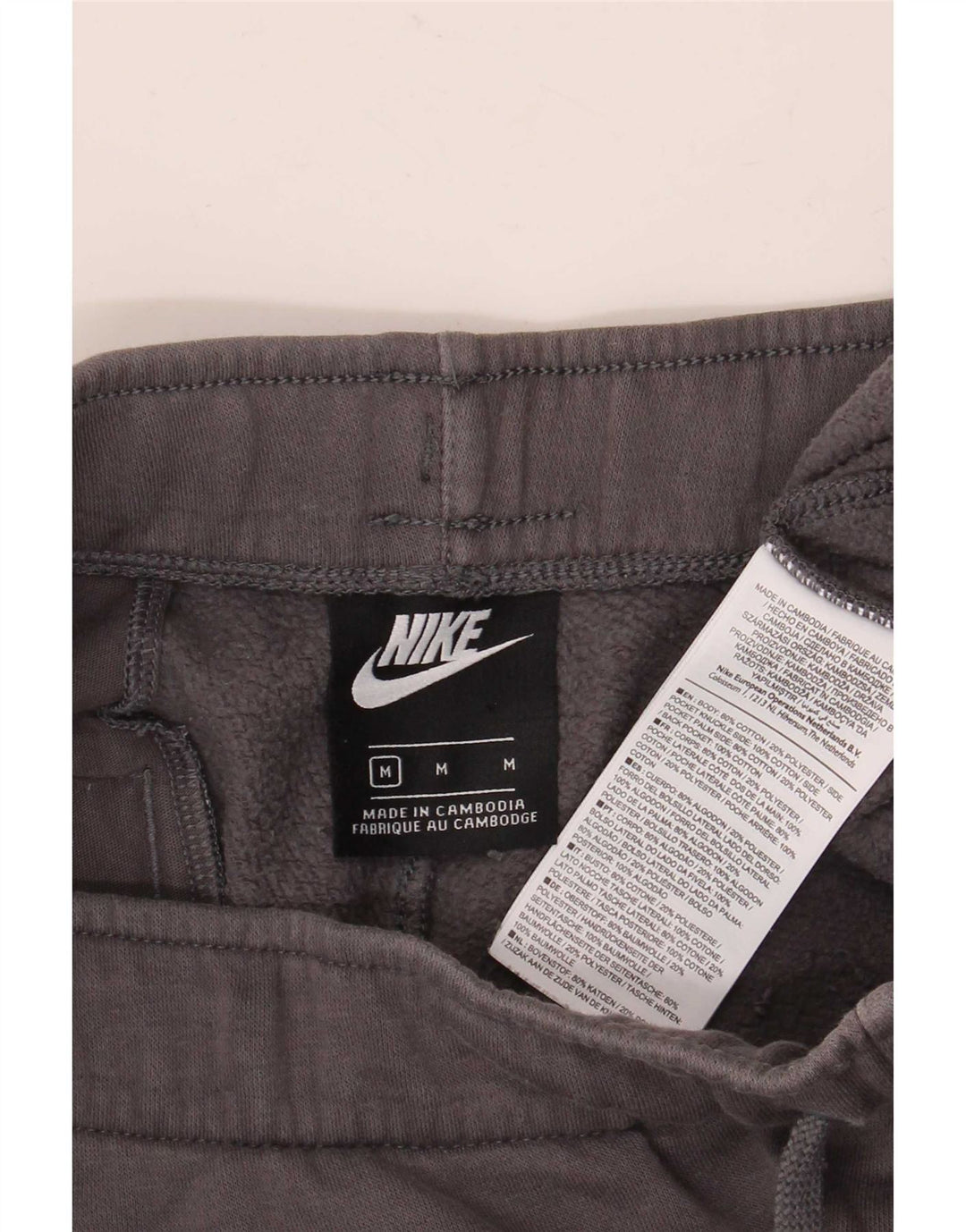 Pantalon de survêtement graphique Nike Homme Pantalon de jogging en coton gris moyen